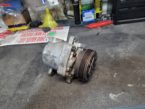 Air conditioning compressor