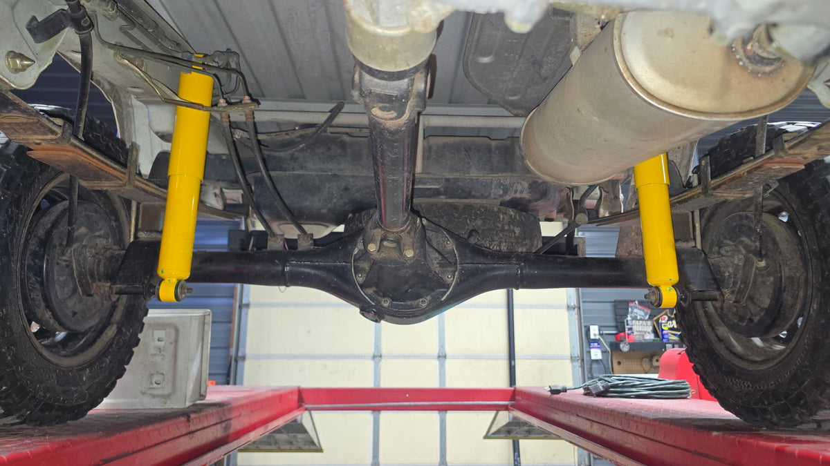 Extended rear shocks installed — rear view